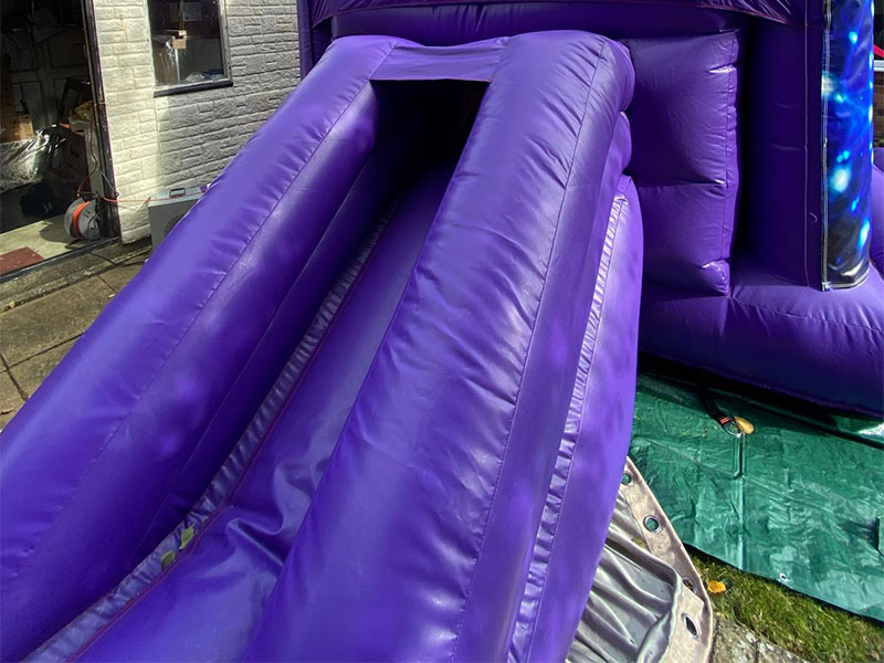 Colorful bouncy castle slide setup